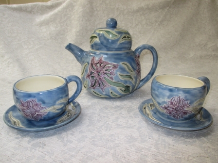 Double Walled Teapot with Cup and Saucers